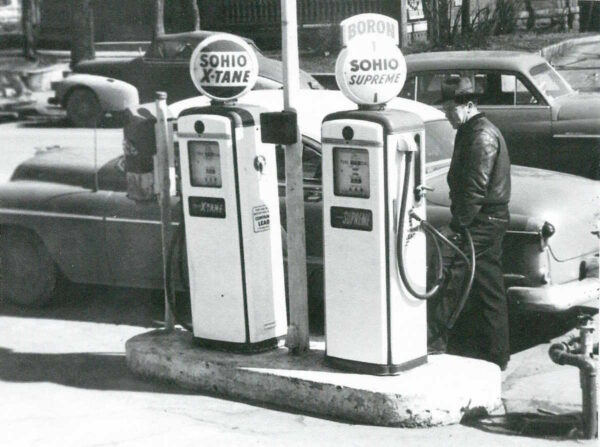 1953 Oldsmobile at gas station
